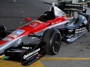 An elaborate system of shuttles and ferry service will allow the public to access Belle Isle Park during Detroit Grand Prix weekend, May 31-June 2, 2013. Shown here is an Indy car at a press conference April 23.