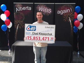 Chad Klepaychuk of Okotoks, Alta. holds his $15.8-million winning lottery cheque in Edmotnon, Wednesday, May 8, 2013.THE CANADIAN PRESS/HO-Western Canada Lottery Corporation