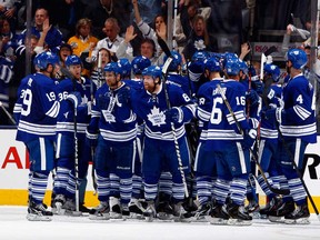 The Toronto Maple Leafs celebrate the win against the Boston Bruins in Game Six of the Eastern Conference Quarterfinals during the 2013 NHL Stanley Cup Playoffs May 12, 2013 at the Air Canada Centre in Toronto.  (Photo by Abelimages/Getty Images)