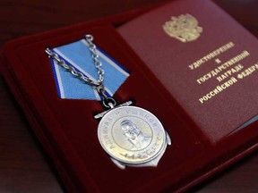 The Admiral Ushakhov medal is seen during a press event in Windsor on Tuesday, May 7, 2013. Several local veterans and a representative of Russia were on hand to announce a new medal that will be given to all navy veterans. (TYLER BROWNBRIDGE/The Windsor Star)