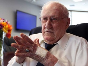 Canadian navy veteran Tommy Simpson, 91, of Windsor, Ont., describes his experience in the Royal Canadian Navy during the Battle of the Atlantic on Tuesday, May 7, 2013. Simpson is one of 38 local veterans to receive the Ushakov Medal from the Russian Federation. (DYLAN KRISTY/The Windsor Star)