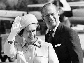File photo of Queen Elizabeth and Prince Phillip waving goodbye to Windsor as they leave for Brantford..(Windsor Star files)