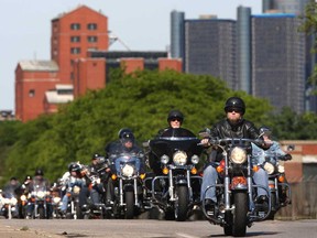 Participants in the Windsor Telus Motorcylce Ride For Dad make their way down Riverside Drive East, Sunday, May 26, 2013.  (DAX MELMER/The Windsor Star)