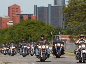 Participants in the Windsor Telus Motorcylce Ride For Dad make their way down Riverside Drive East, Sunday, May 26, 2013.  (DAX MELMER/The Windsor Star)