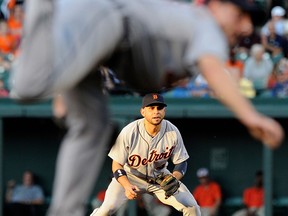 Detroit's Omar Infante, right, watches pitcher Max Scherzer throw a pitch in Baltimore Friday. (Photo by Greg Fiume/Getty Images)