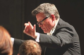 Windsor Symphony Orchestra conductor laureate John Morris Russell conducts during the Russell and Scheirich Reunited concert at the Capitol Theatre in Windsor, Ont., on Saturday, May 11, 2013. (REBECCA WRIGHT/ The Windsor Star)