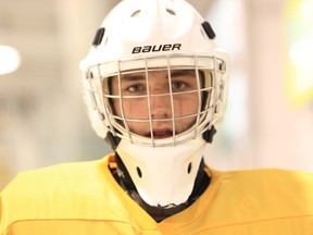 Spits draft pick Brendan Johnston takes a break during practice at a spring camp with the LaSalle Vipers Wednesday. (JASON KRYK/The Windsor Star)