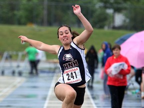 Carly Steer of Holy Names competes in the long jump during the SWOSSAA track and field championship at Alumni Field in Windsor Thursday. (TYLER BROWNBRIDGE/The Windsor Star)