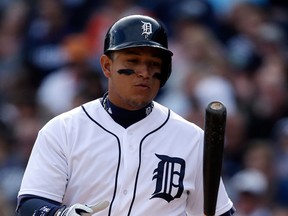 Detroit's Miguel Cabrera tosses his bat after striking out swinging during the fifth inning against the Minnesota Twins in Detroit Saturday. (AP Photo/Carlos Osorio)