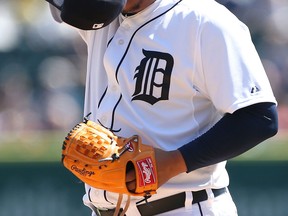 Detroit reliever Bruce Rondon takes a break after allowing a triple by Minnesota's Aaron Hicks in the seventh inning at Comerica Park. (Photo by Leon Halip/Getty Images)