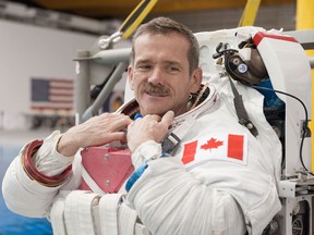 This photo obtained from NASA on May 13, 2013 shows Canadian Space Agency astronaut Chris Hadfield,who touched down on Earth on May 13, 2013.(AFP / NASA/JAMES BLAIR/AFP/Getty Images)