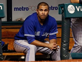 Toronto Blue Jays starting pitcher Ricky Romero sits in the dugout after being removed during the first inning against the Tampa Bay Rays. (AP Photo/Mike Carlson)