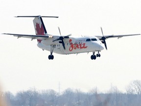 An Air Canada Jazz plane comes in for a landing at Windsor Airport. Members of Parliament just got a raise and an increase to their travel expense accounts, but they say schlepping to and from Ottawa isn’t all champagne and caviar.(Windsor Star files)