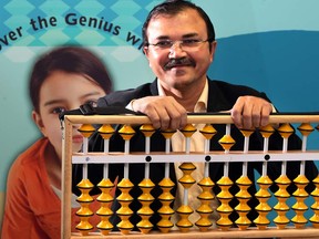 Amit Modi, president Mental Math Schools on Dougall Avenue, says said that by using an abacus to form an image of every number and flashcards to store numerical images on the brain, children are able to perform complex calculations at much highers speeds than punching numbers into a calculator. (NICK BRANCACCIO/The Windsor Star)