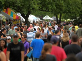 A large crowd  of people stroll through Willistead Park for Art in the Park last year.   (DAX MELMER/The Windsor Star