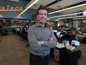 Windsor Star editor-in-chief Marty Beneteau stands in the newsroom of the newspaper's new home. (DAN JANISSE / The Windsor Star)