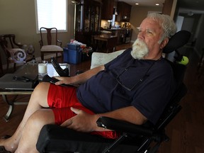 Bernie Campbell is a retired RCMP officer who worked mostly in the drug squad and suffers from AV malfunction (a genetic condition that saw veins carry away oxygenated blood from his spine) that has left him in a wheelchair for life.         (TYLER BROWNBRIDGE/The Windsor Star)
