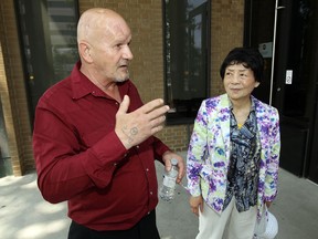 Brian Meloche and Wen Fen (Jennifer) Liu leave Superior Court in Windsor on Friday, May 31, 2013. (TYLER BROWNBRIDGE/The Windsor Star)