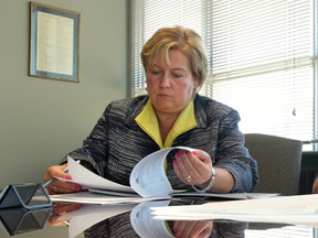 City of Windsor CAO Helga Reidel reads through a report in this 2012 file photo. (Jason Kryk/Windsor Star files)