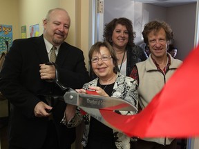 In this file photo, David Kerr, left, Jean Foster, Christine Dean and Erwin Bernauer are shown at a ribbon-cutting ceremony to open the new Windsor Public Library Deaf Literacy Program on November 2, 2011.  (Windsor Star files)