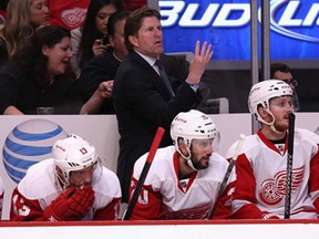 Red Wings head coach Mike Babcock complains to a referee during Game 5 against the Blackhawks at the United Center May 25, 2013 in Chicago. The Blackhawks defeated the Red Wings 4-1. (Jonathan Daniel/Getty Images)