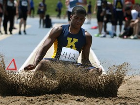 Kingsville's Dominic Domas competes in senior boys long jump during the WECSSAA track and field championships at Alumni Field in Windsor Thursday, May 16, 2013. (TYLER BROWNBRIDGE/The Windsor Star)