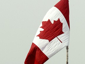 A Canadian Flag flies over a Windsor truck stop in this 2007 file photo. (Tyler Brownbridge / The Windsor Star)