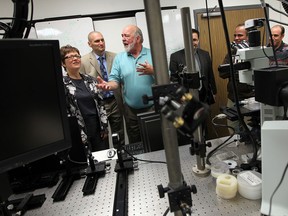Brian Fryer leads MPP Teresa Piruzza (left) and MP Jeff Watson on a tour during a funding announcement at the Great Lakes Institute for Environmental Research at the University of Windsor on Friday, May 24, 2013. Both the federal and provincial governments have committed $2.52 million each for the research done at the institute.                       (TYLER BROWNBRIDGE/The Windsor Star)