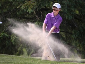 Brett Harrison, 14, pitches out of the sand on the seventh hole during the Jamieson Junior Golf Tour qualifying event at Fox Glen Golf Club Sunday, May 26, 2013. (DAX MELMER/The Windsor Star)