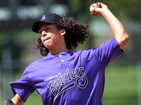 Assumption starter Desmond Verro delivers a pitch against Walkerville in WECSSAA boys baseball action at Realtor Park Wednesday May 8, 2013. (NICK BRANCACCIO/The Windsor Star)