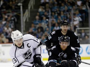 Kings captain Dustin Brown , left, battles San Jose's Joe Pavelski during Game 6 of the Western Conference semifinals at HP Pavilion on May 26, 2013 in San Jose, California.  (Photo by Ezra Shaw/Getty Images)