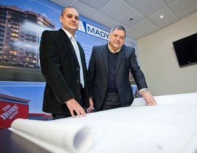 David Mady, president of Mady Development Corporation, and his father Chuck Mady, founder and CEO, at their Markham, Ont., offices. (Windsor Star files, 2013)