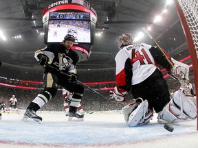Pittsburgh's Brenden Morrow, left, scores in the first period against Ottawa goalie Craig Anderson in Game 5 of the Eastern Conference semifinal at Consol Energy Center May 24, 2013 in Pittsburgh. (Justin K. Aller/Getty Images)