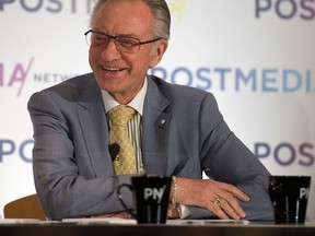 Files: Paul Godfrey, Postmedia President and CEO, spoke to employees via a web cast during the Postmedia business update, Friday April 19, 2013. [Peter J. Thompson/National Post]