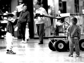 Kids check out the Windsor police robot investigator during Police Week at Devonshire Mall in this 1990 file photo. (Scott Webster / The Windsor Star)