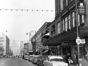 Ouellette Avenue is seen looking northward in this photo from December 1958. The Canada Building is on the right and the old Palace theatre can be seen on the right in the background.  (FILES/The Windsor Star)