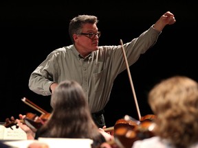 Maestro John Morris Russell is back with WSO for shows Saturday night and Sunday matinee at the Capitol Theatre.  Here Russell rehearses with the WSO. (NICK BRANCACCIO / The Windsor Star)