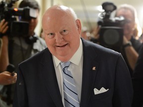 Senator Mike Duffy leaves a meeting of the Senate Internal Economy, Budgets and Administration committee on Parliament Hill Thurday May 9, 2013 in Ottawa. (THE CANADIAN PRESS/Sean Kilpatrick)