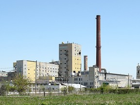 The smokestack at the former General Chemical site, pictured at right in this 2009 file photo, was demolished this morning, Saturday, May 25, 2013.  (TYLER BROWNBRIDGE/ The Windsor Star)