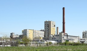 The smokestack at the former General Chemical site, pictured at right in this 2009 file photo, was demolished this morning, Saturday, May 25, 2013.  (TYLER BROWNBRIDGE/ The Windsor Star)