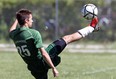 Stefan Boulineau of Lajeunesse kicks the ball away from Forster players in the WECSSAA boys A soccer final at Forster May 24, 2013.  (NICK BRANCACCIO/The Windsor Star)