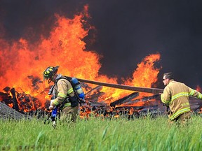 Scene of a huge industrial fire at a plastics recycling facility on Sprucewood  Avenue in Windsor, Ontario on May 21, 2013.  (JASON KRYK/ The Windsor Star)