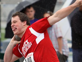 Jarrett Nantais competes in the shot put during the SWOSSAA Track and Field competition at Alumni Field in Windsor on Thursday, May 23, 2013.                      (TYLER BROWNBRIDGE/The Windsor Star)