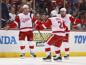 Detroit's Justin Abdelkader, left, and Pavel Datsyuk celebrate Abdelkader's goal in the first period against the Anaheim Ducks in Game 7 of the Western Conference quarter-finals at Honda Center on May 12, 2013 in Anaheim, California.  (Photo by Jeff Gross/Getty Images)