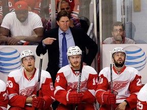 Red Wings coach Mike Babcock gestures to his players during the first period in Game 7 of the Western Conference semifinal against the Chicago Blackhawks, Wednesday, May 29, 2013, in Chicago. (AP Photo/Nam Y. Huh)