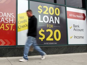 Cheque cashing and payday loans store on Ouellette Avenue at Wyandotte Street in downtown Thursday June 6, 2013. (NICK BRANCACCIO/The Windsor Star)