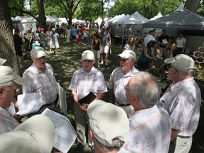 Guys Who Like To Sing, an a cappella group, perform at the 35th annual Art in the Park at Willistead Park, June 1, 2013.