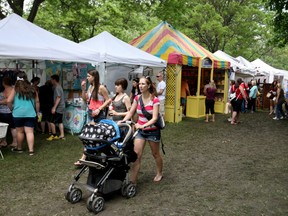 In this file photo, people browse through the various vendors at the 35th annual Art in the Park at Willistead Park, Saturday, June 1, 2013.  (DAX MELMER/The Windsor Star)