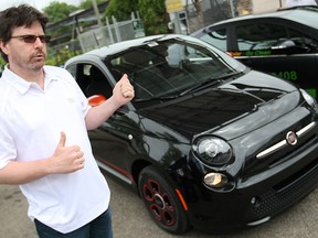 Eric Mayne, media relations manager at Chrysler Group LLC, talks about the Fiat 500e, an electric vehicle not yet available in Canada, at the Electric Vehicle Event at the Renewable Energy Technology Centre, Saturday, June 8, 2013. (DAX MELMER/The Windsor Star)