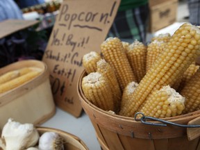 Popcorn, sold on the cob and in a brown paper bag, is on display at the Downtown Windsor Farmers' Market in this 2013 file photo.  (DAX MELMER/The Windsor Star)